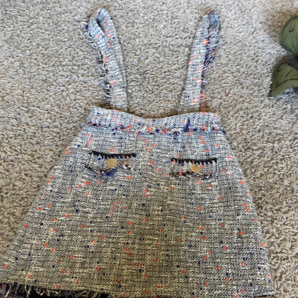 distressed white and black tweed overall skirt with orange blue and gold accents